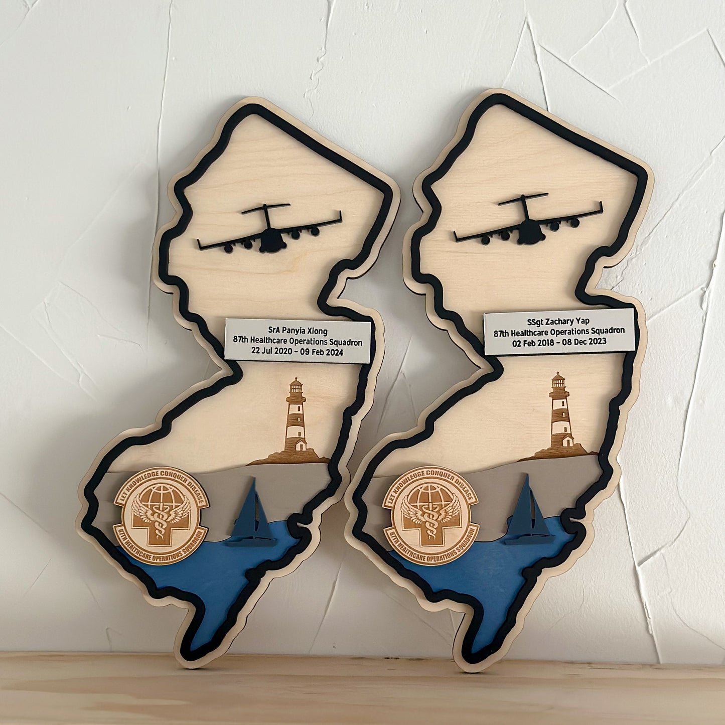 Solid wood state-shaped military wall decor showing thickness and finish