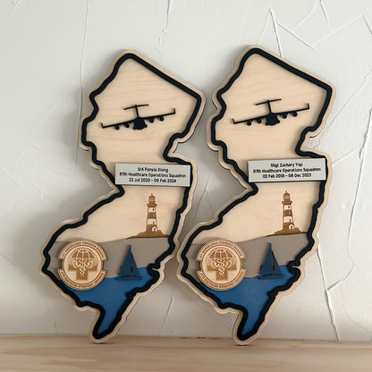 Solid wood state-shaped military wall decor showing thickness and finish